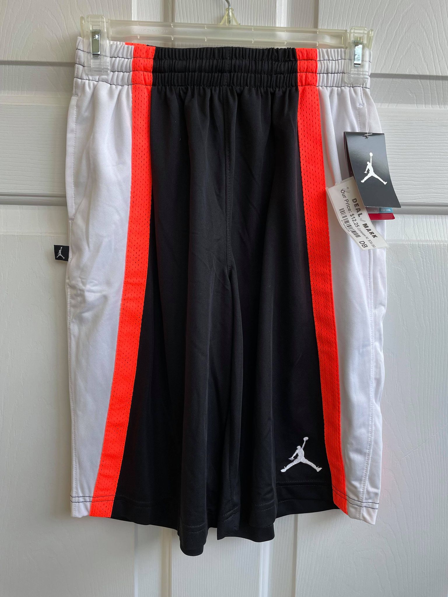 black and orange jordan shorts